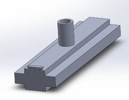 CAD illustration of a rectangular BREW component with a raised cylindrical opening